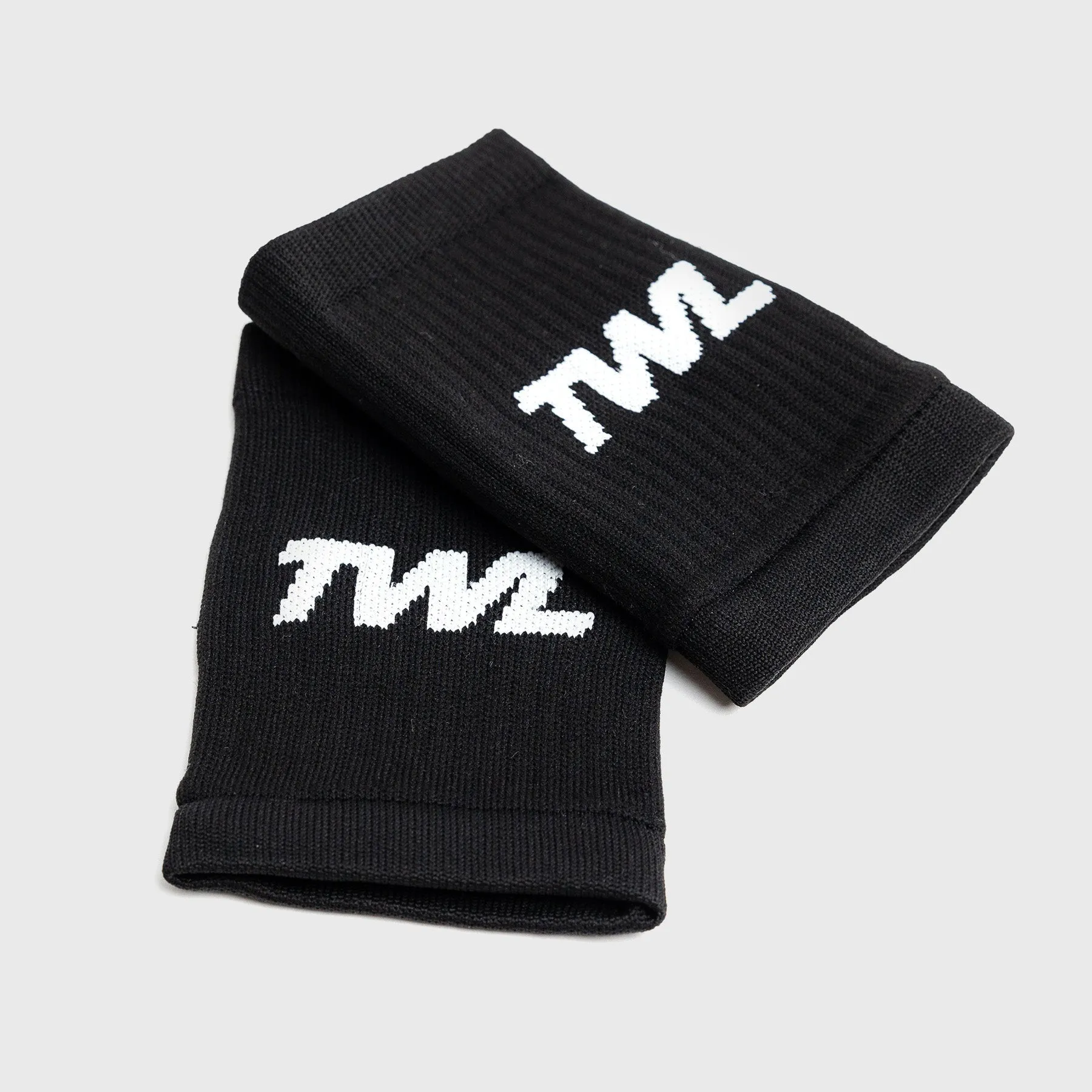 TWL - KNITTED WRISTBANDS - PAIR - BLACK/WHITE